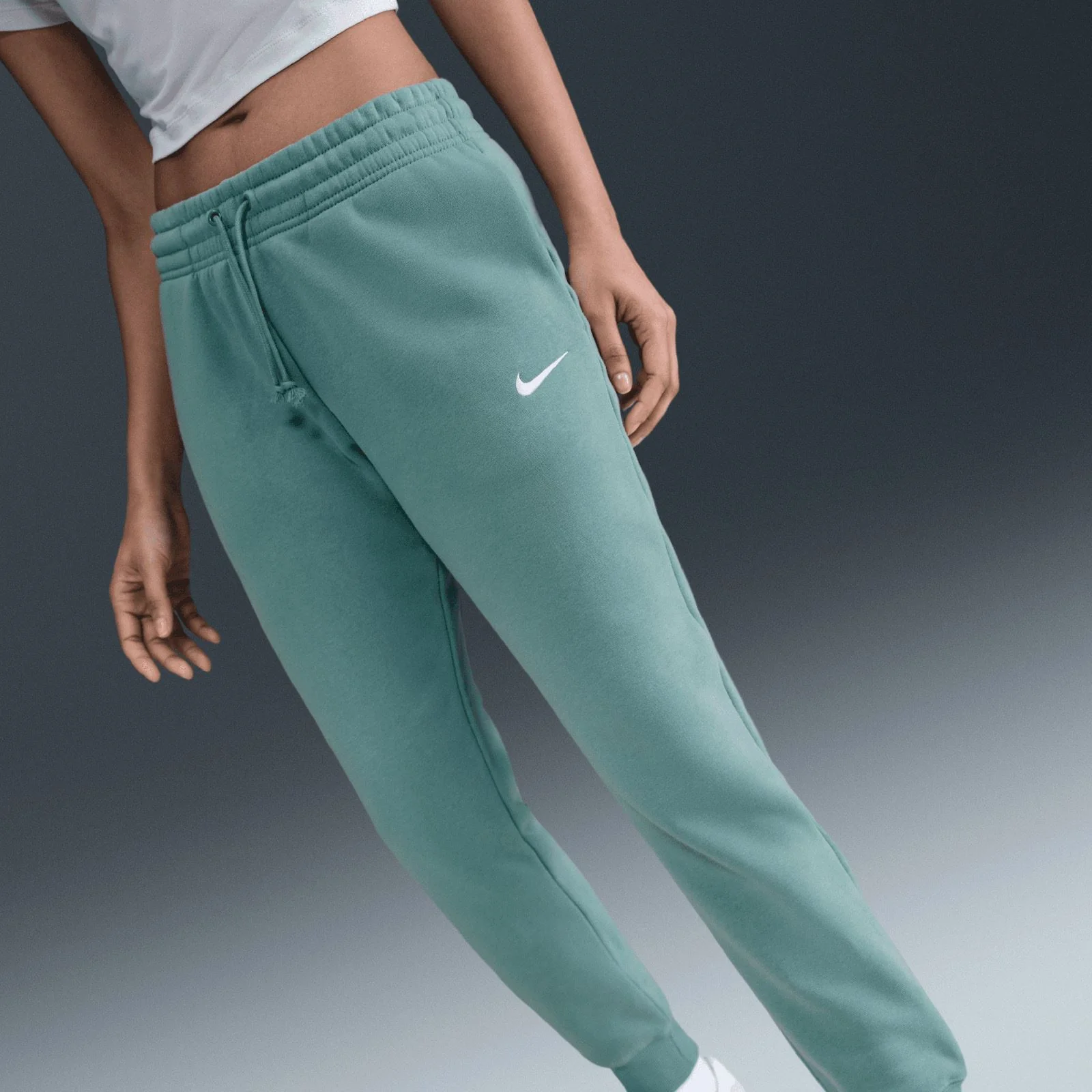 10731-nike-sportswear-phoenix-fleece-womens-mid-rise-sweatpants-4.webp Nike Sportswear Phoenix Fleece Womens Mid-Rise Sweatpants